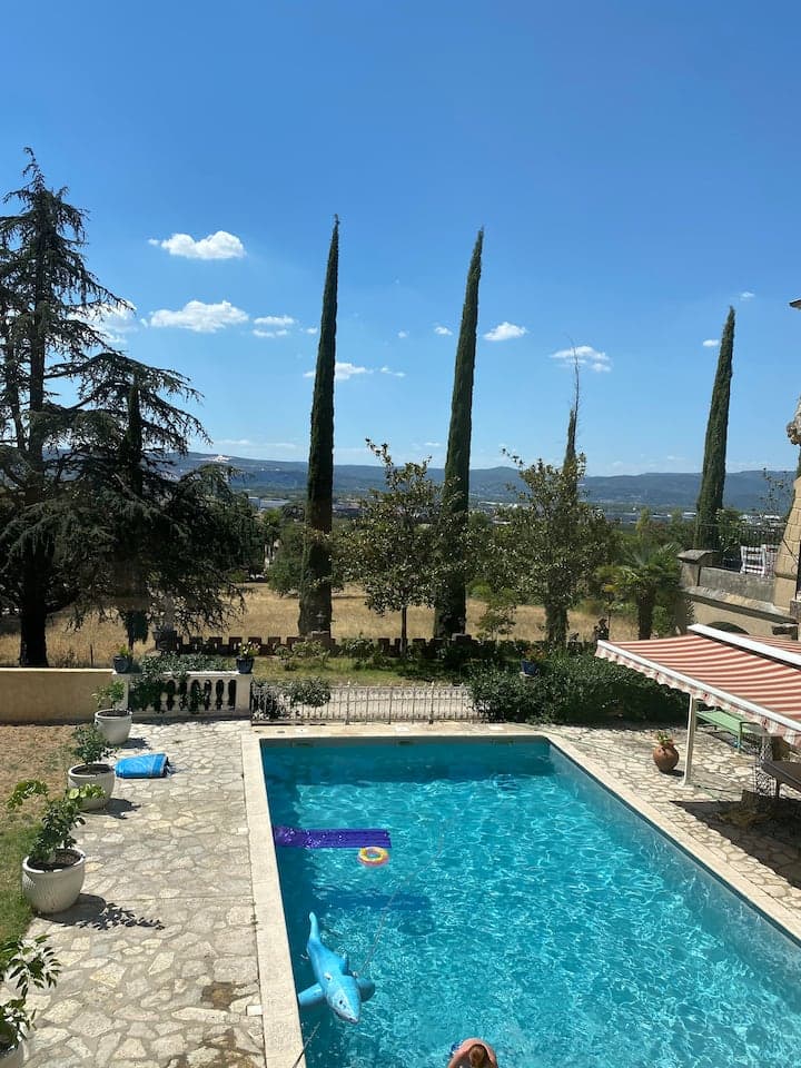 The Perchoir pool with a view over the surrounding countryside